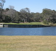 Ocean Links' 18th green sticks out into a pond across from the seventh fairway.