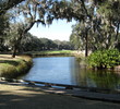 You'll need to thread a tee shot under a canopy of live oaks and over a pond at No. 15 on the Oak Marsh course at Amelia Island Plantation.