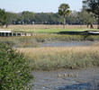 A large bulkhead green and a long, 171-yard carry highlight the par-3 16th on the Oak Marsh course at Amelia Island Plantation.  