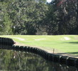 A creek winds through No. 8 at Oak Marsh, a short par 4 that ends with a narrow approach shot.  