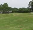 The trip to Cimarrone GC's first green is a roller-coaster ride over mounds.