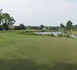 Cimarrone Golf Club puts two par 5s back to back. The 14th hole is a dogleg right around water.