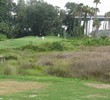 Queen's Harbour Yacht & Country Club's par-3 13th is a tricky little hole next to the Intracoastal Waterway under swirling winds.