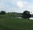 Queen's Harbour Yacht & Country Club's sixth hole is a formidable par 4 with water close right and sand left at the green.