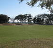 The Amelia River serves as the backdrop for the final green at Amelia River Golf Club.