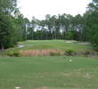 The 15th hole at The Golf Club at Fleming Island follows the par-3 theme: lots of bunkers right of the green.