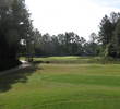 The par-3 seventh hole at Bent Creek Golf Course pulls everything right into the bunker. 