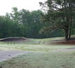 A trap by the green seems to rise up toward your approach shot to the first green at Bent Creek Golf Course.