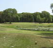 The seventh green on the South Course at Fernandina Beach Golf Club slopes to the front, possibly bringing a bunker back into play.