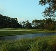 The 448-yard seventh hole on the Players Stadium Course at TPC Sawgrass has all the elements of difficulty -- water, sand, length and dogleg.
