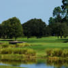 A view of green surrounded by water at Windsor Parke Golf Club